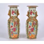 A pair of 19th Century Chinese Canton rose medallion baluster vases, decorated in overglaze