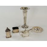 A 1977 silver hallmarked pin dish, London maker, diameter 8.5cm, together with a three piece cruet