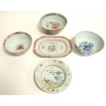 A group of 18th Century and later Chinese export porcelain plates and bowls, all a/f and with