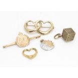 A collection of gold brooches and charms, including a 9ct gold sweetheart George V Royal Engineers