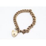 A 15ct gold curb linked padlock clasp bracelet, with safety chain, 16g