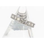 A diamond full eternity band, in white metal, channel set brilliant cuts, ring size L, 4.7g,