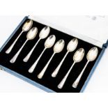 A set of eight 1960s silver British Hallmarks teaspoons, in case, 3.45ozt