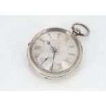 A Victorian silver large open faced pocket watch, 56mm, silvered dial with gilt roman numerals,