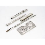 An Art Deco period sterling silver retractable pencil, together with a silver dip fountain pen, a