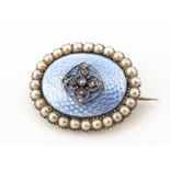 An Edwardian enamel diamond and seed pearl oval brooch, the blue enamel translucent ground set