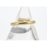 A 22ct gold D shaped wedding band, ring size L, 2.6g