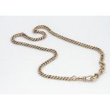 A 9ct gold curbed link watch chain converted to a necklace, with snap clasps, marked JK, 42cm