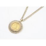 A Victorian half sovereign ansell back half sovereign and 9ct gold pendant, dated 1891 with