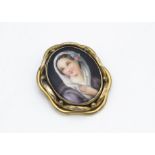 A 19th Century continental porcelain and gilt metal oval brooch, transfer printed with portrait of