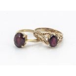 Two 9ct gold garnet dress rings, each set with oval mixed cut garnets in claw settings, one in