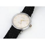 A c1960s Oris stainless steel gentleman's wristwatch, 31mm, manual wind, appears to run, on woven