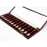 A 1970s set of the Tichborne Spoons, the twelve each with gilt figure to terminal, in box with