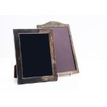 A modern silver photograph frame, 22cm, together with an early 20th Century silver photograph frame,