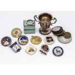 A small group of collectables, including a miniature silver trophy cup, a thin 22ct wedding band,