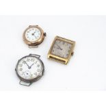 Three vintage watches, one 9ct gold square cased, the other 9ct gold circular cased, and a silver