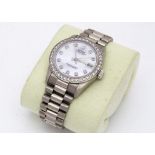 A Rolex Datejust 18ct white gold and diamond lady's wristwatch, 31mm case, having diamond dot