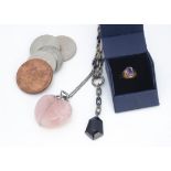 A 9ct gold amethyst dress ring, together with a marcasite and onyx necklace, a rose quartz and