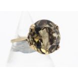 A 9ct gold smoky quartz cocktail ring, ring size R, 7.4g