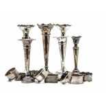 Two pairs of Art Deco period silver filled trumpet vases, together with another single vase, a