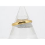 A 22ct gold wedding band, ring size P, 3g