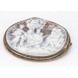 A 9ct gold and shell cameo oval brooch, with carved allegorical scene of classical figures and