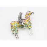 A silver, enamel and marcasite horse and jockey brooch, 3.8cm x 3.5cm