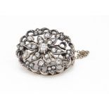 A Victorian oval gold and silver set diamond brooch, the old cut diamonds in a floral setting