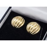 A pair of continental 18ct gold circular shaped clip earrings, 1.8cm diameter, marked 750 to clip,