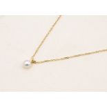 A boxed Mikimoto 18ct gold cultured pearl drop pendant necklace, the fine gold chain supporting a
