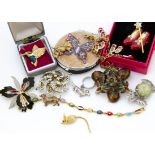 A collection of costume jewellery, including a Joan Rivers enamel ladybird bracelet, various