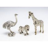 Three modern white metal African animals, each marked d'Argent and 925, including a giraffe, 14.5cm,