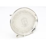 A George III silver teapot stand by Peter & Ann Bateman, London 1796, oval on four supports with