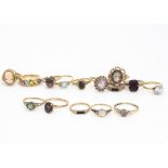 A quantity of 9ct gold gem set dress rings, including onyx, tourmaline, citrine, amethyst and