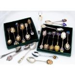 A collection of silver and silver plated souvenir teaspoons