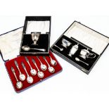 A set of eight silver commemorative teaspoons by Charles Boyton & Sons, in case, for the Monarchs of