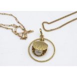 A continental 9ct gold pearl pendant, set with cultured pearl within a clam, and two gold necklaces,