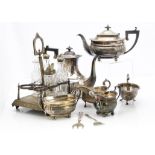 A collection of silver plate, including a Hukin & Heath coffee pot, a candelabra, tea set, and more