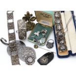 A collection of silver and costume jewels, including a Middle Eastern filigree bracelet, a silver