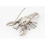 A modern continental white metal model of a lobster, 10cm and 2.5ozt
