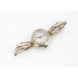 An Art Deco period 9ct gold cased lady's wristwatch, on an expanding strap marked 9ct, 18.4g,