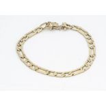 A continental yellow metal curb link bracelet, with tongue and box clasp marked 18K, 19cm, 10g