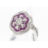 A Belle Epoque ruby and diamond tablet dress ring, with old cut within a pave ruby setting and a