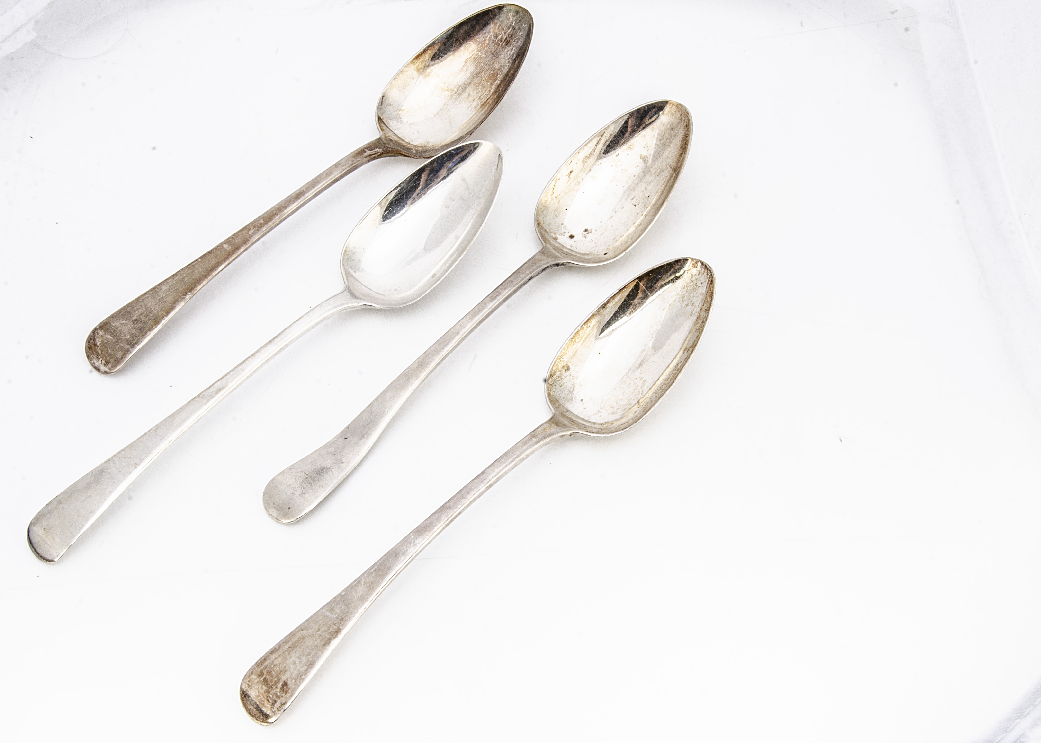 A set of four George III silver table spoons by Richard Crossley, Old English pattern, London