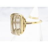 A citrine claw set yellow metal dress ring, ring size M, 5.8g