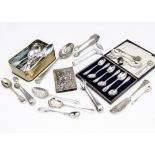 A small collection of silver and silver plated spoons and serving utensils, also a set of six silver