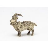 A small modern silver figure of a goat, 3.1ozt, 6.6cm long