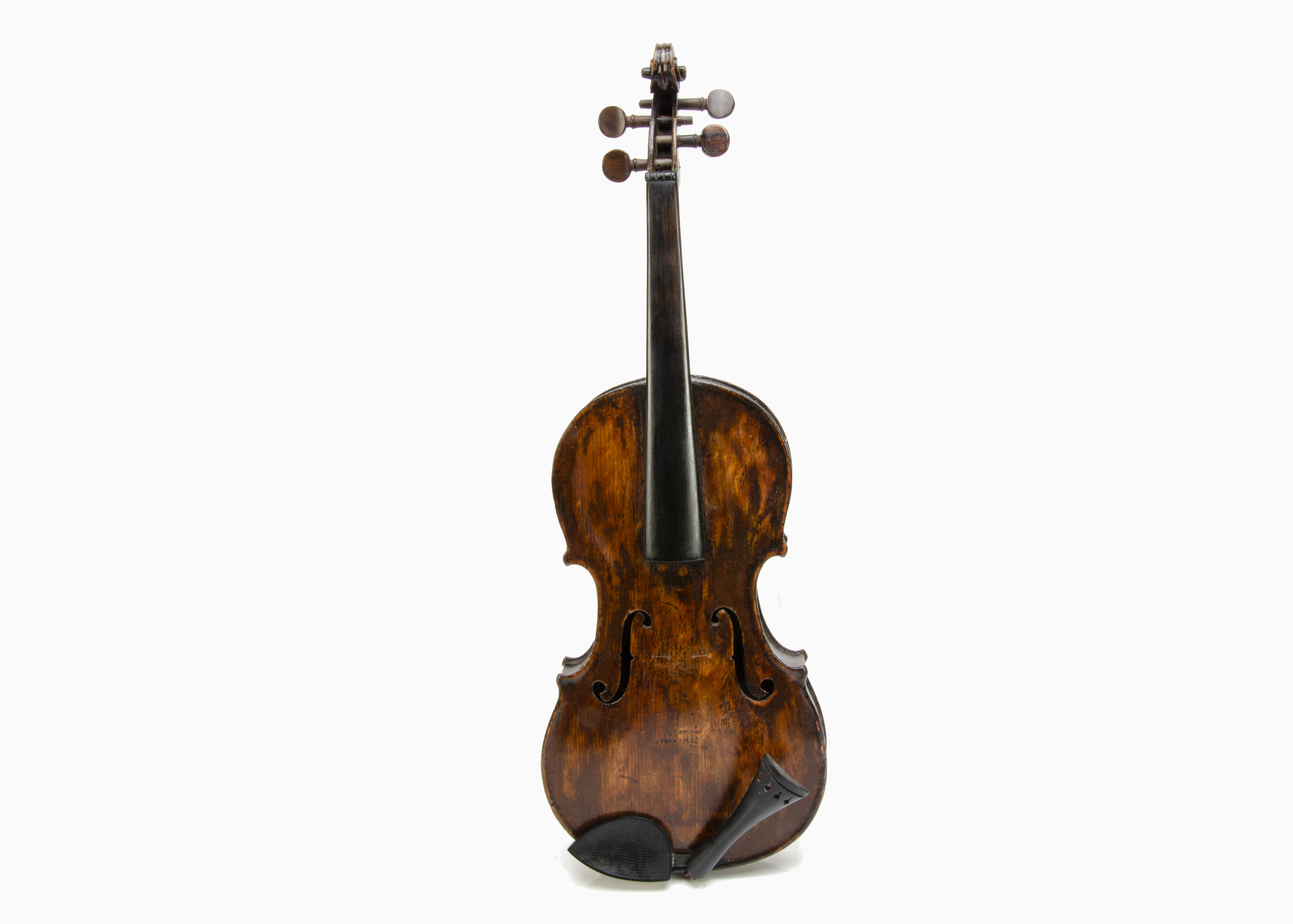 Violin, an unmarked full size violin, highly re-varnished with no strings or bridge - with bow (