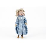 A small Simon & Halbig for Kämmer & Reinhardt child doll, with brown sleeping eyes, blonde mohair