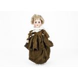 A Kämmer & Reinhardt child doll, with brown sleeping eyes, blonde mohair wig, jointed composition
